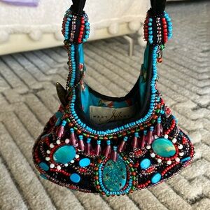 Mary Frances beaded bag with magnet closure